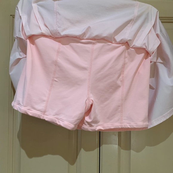 Lululemon skort Worn once. Color is peach not orange. Super cute for summer ! - Picture 7 of 7